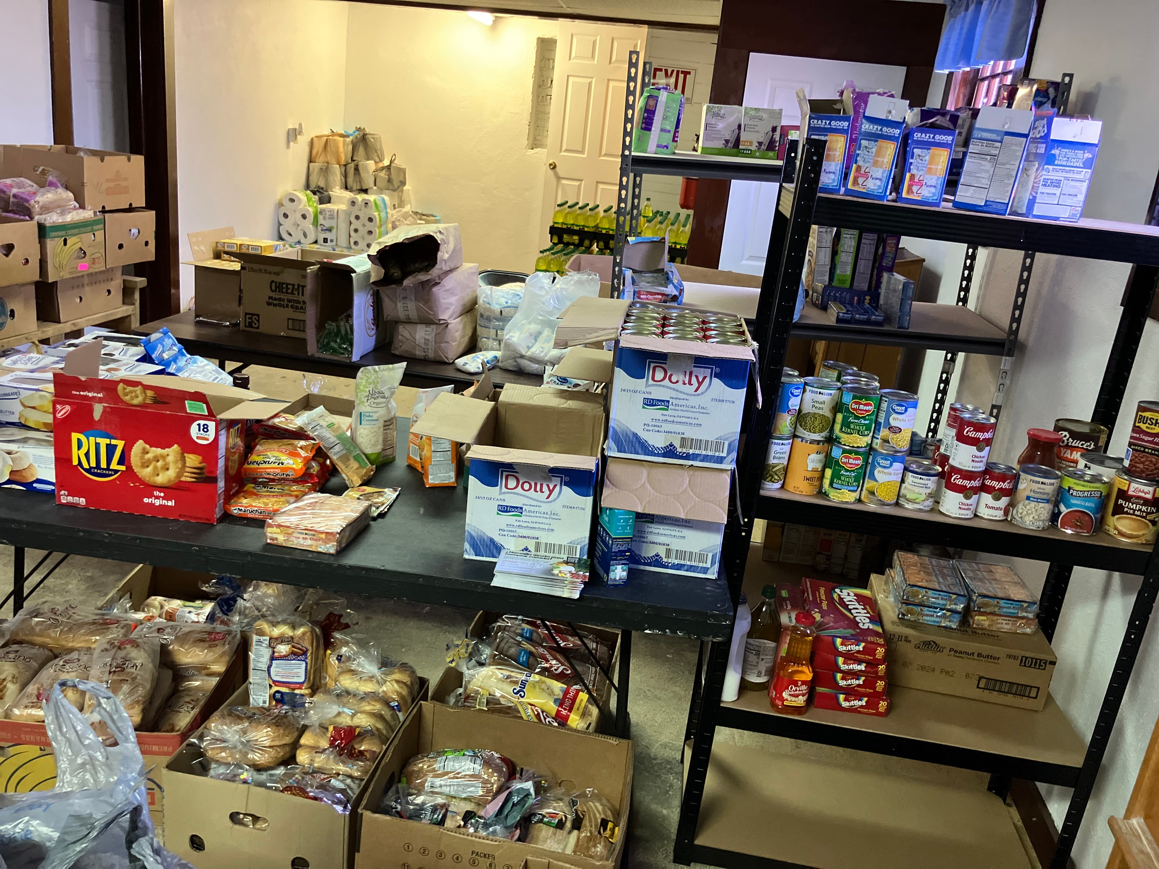 Community food pantry volunteers distributing food